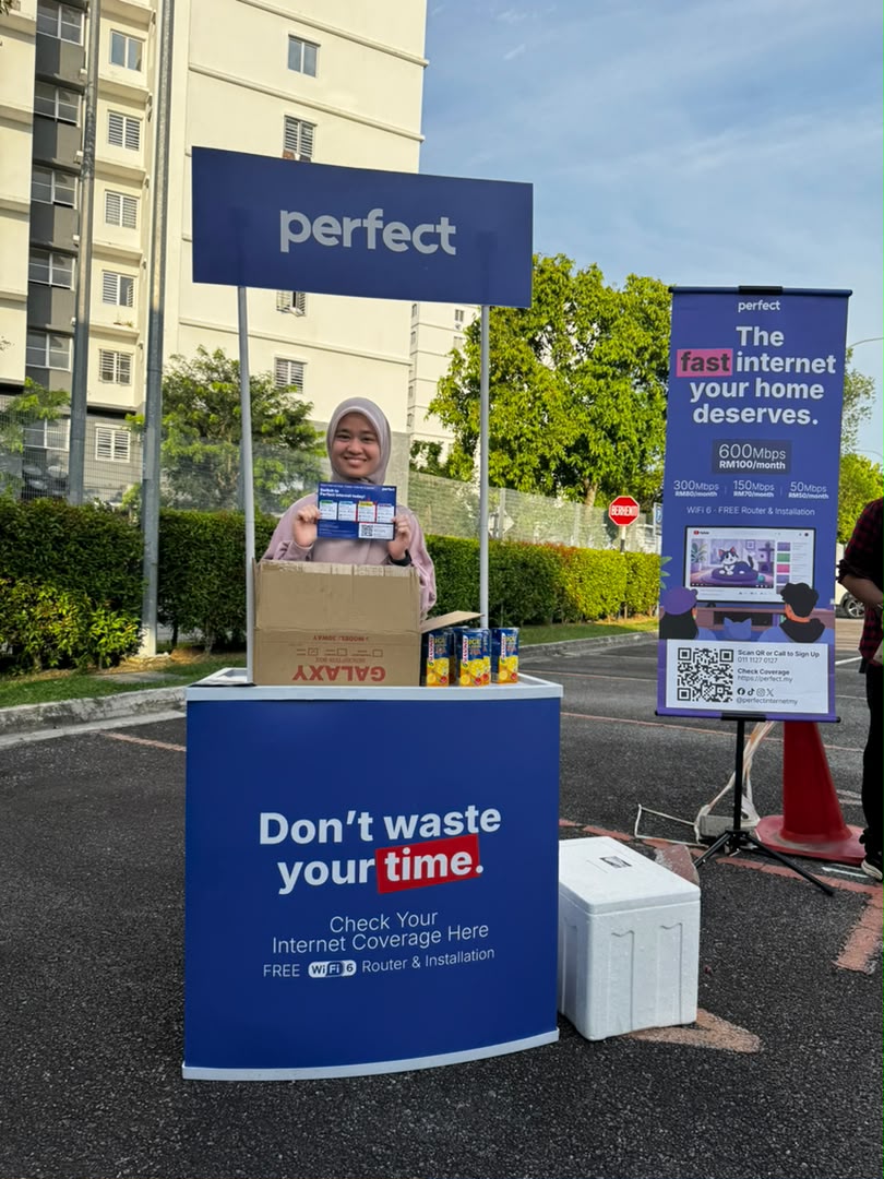 Perfect on-ground booth with team member at a high-rise carpark