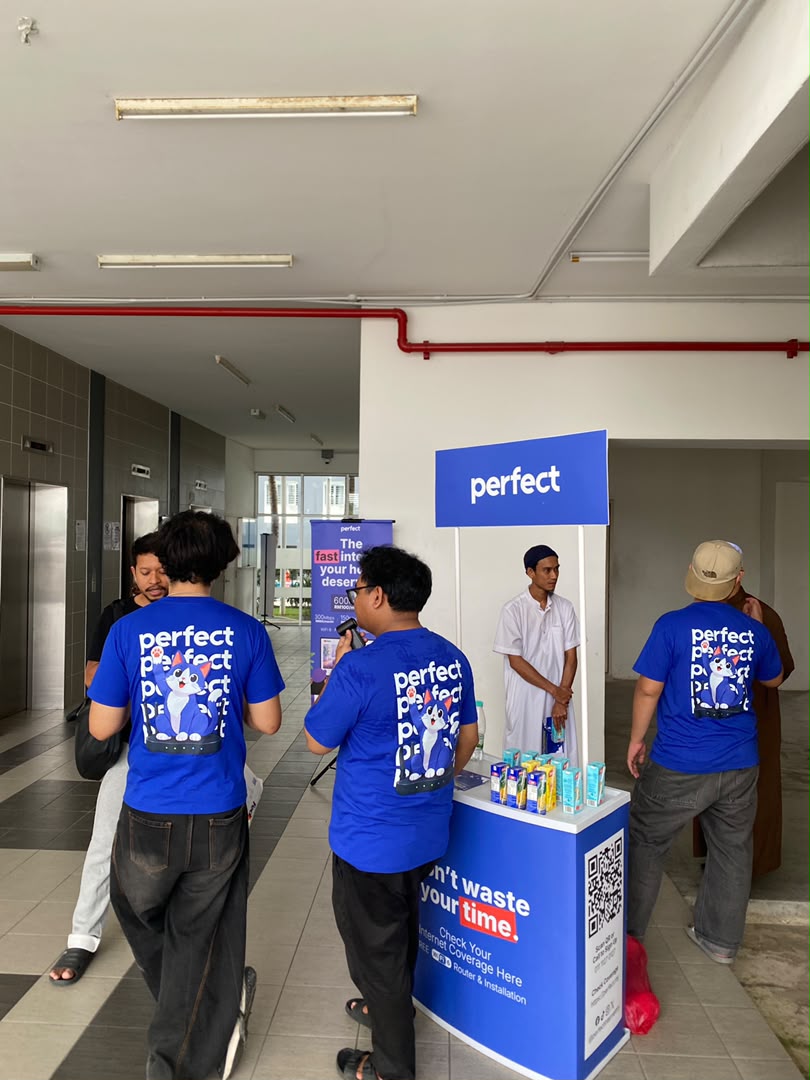 Perfect lobby activation with team in branded t-shirts signing up residents